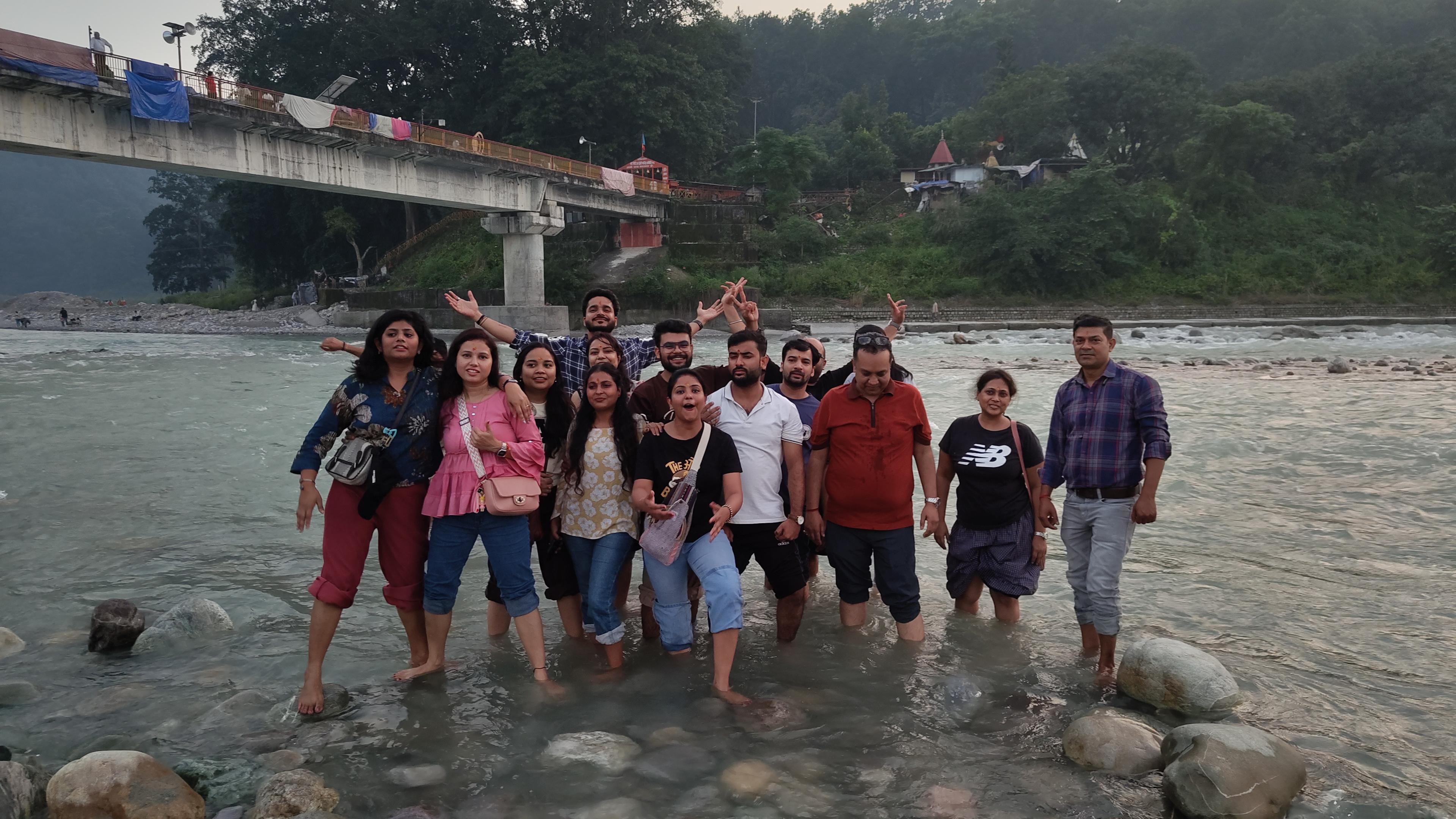 Team having fun in the river