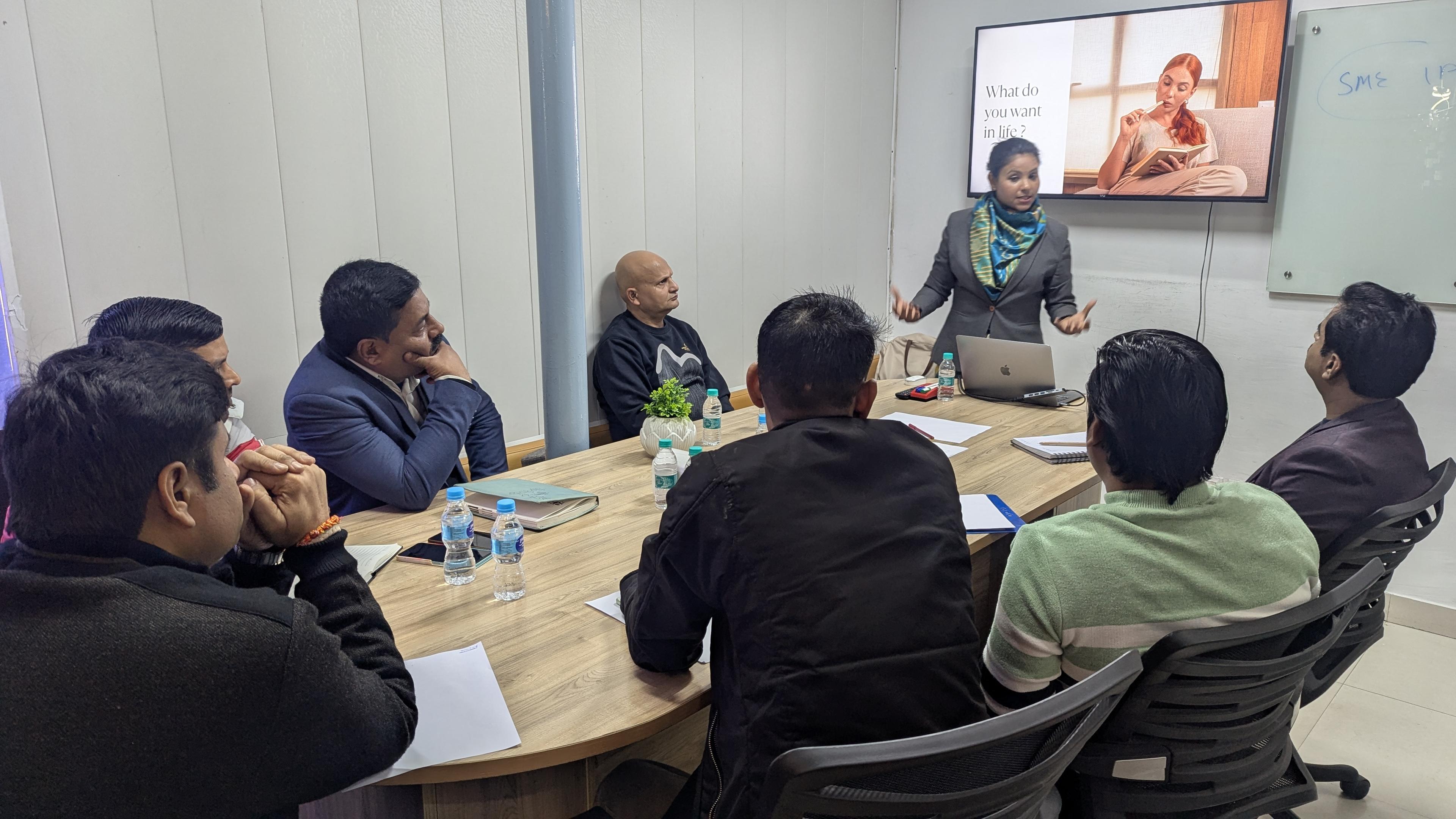 Workshop with business owners around a conference table